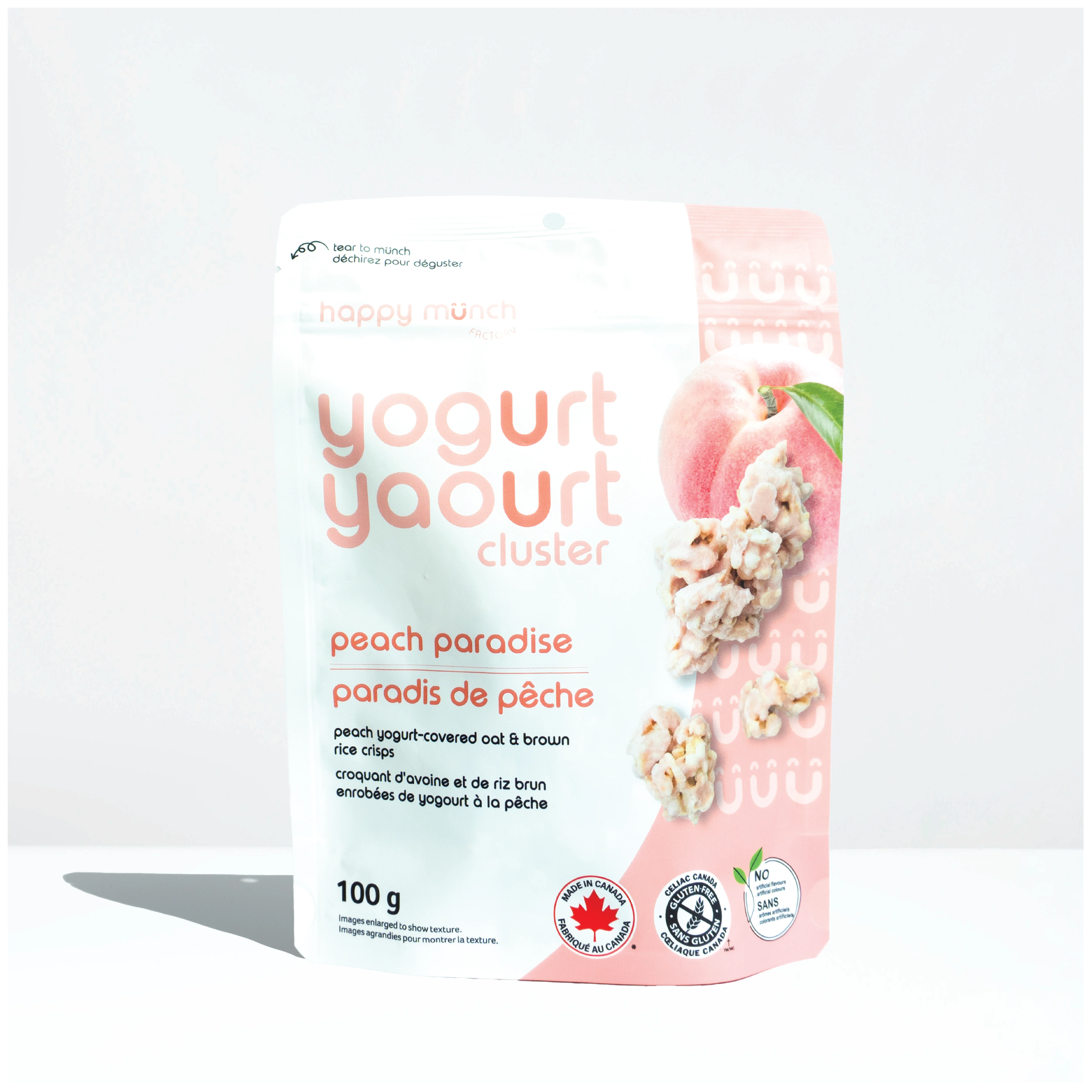 Front of Happy Munch Peach Paradise yogurt cluster packaging on a white background