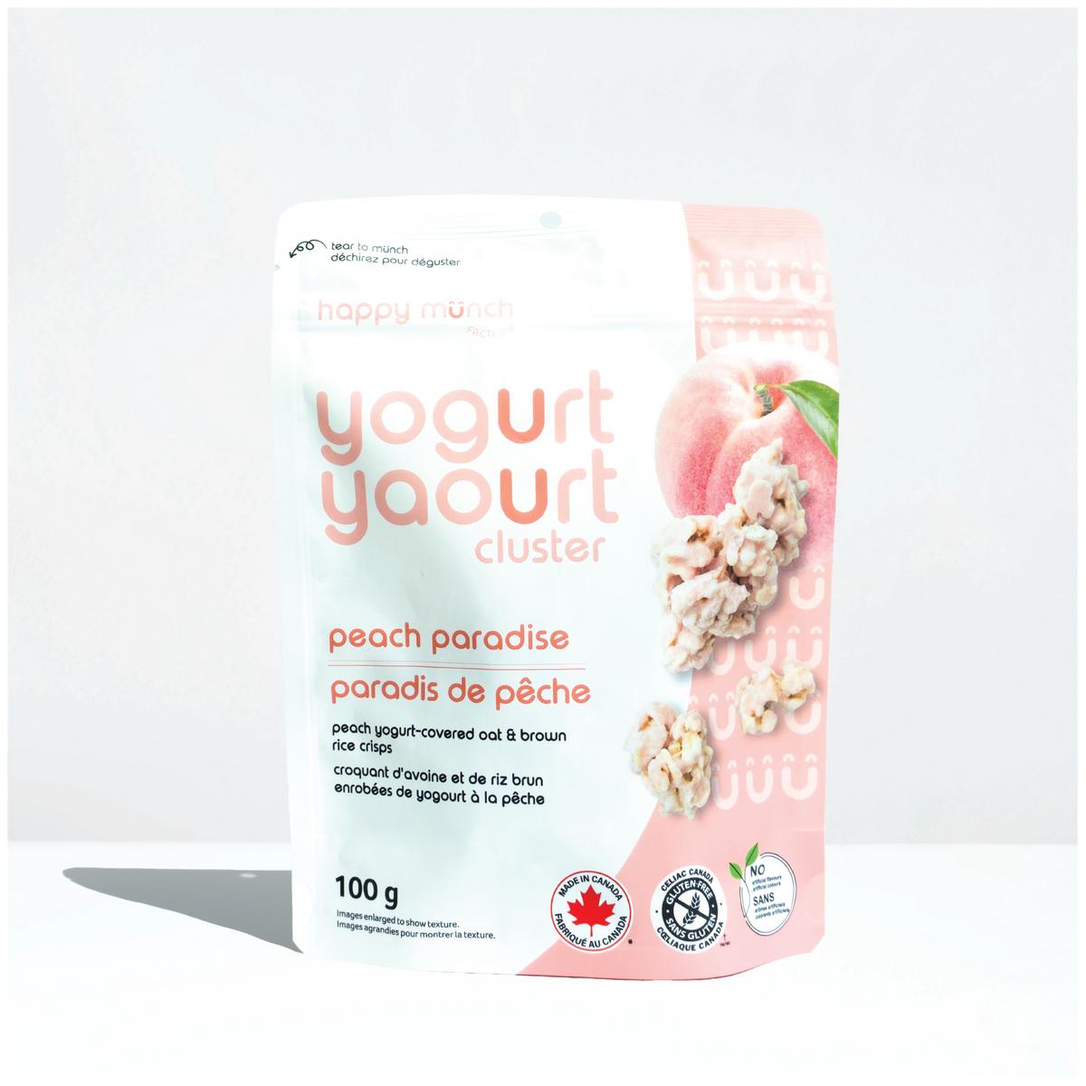 Front of Happy Munch Peach Paradise yogurt cluster packaging on a white background