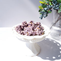 Happy Munch Blueberry Bliss in a white decorative bowl on a light background
