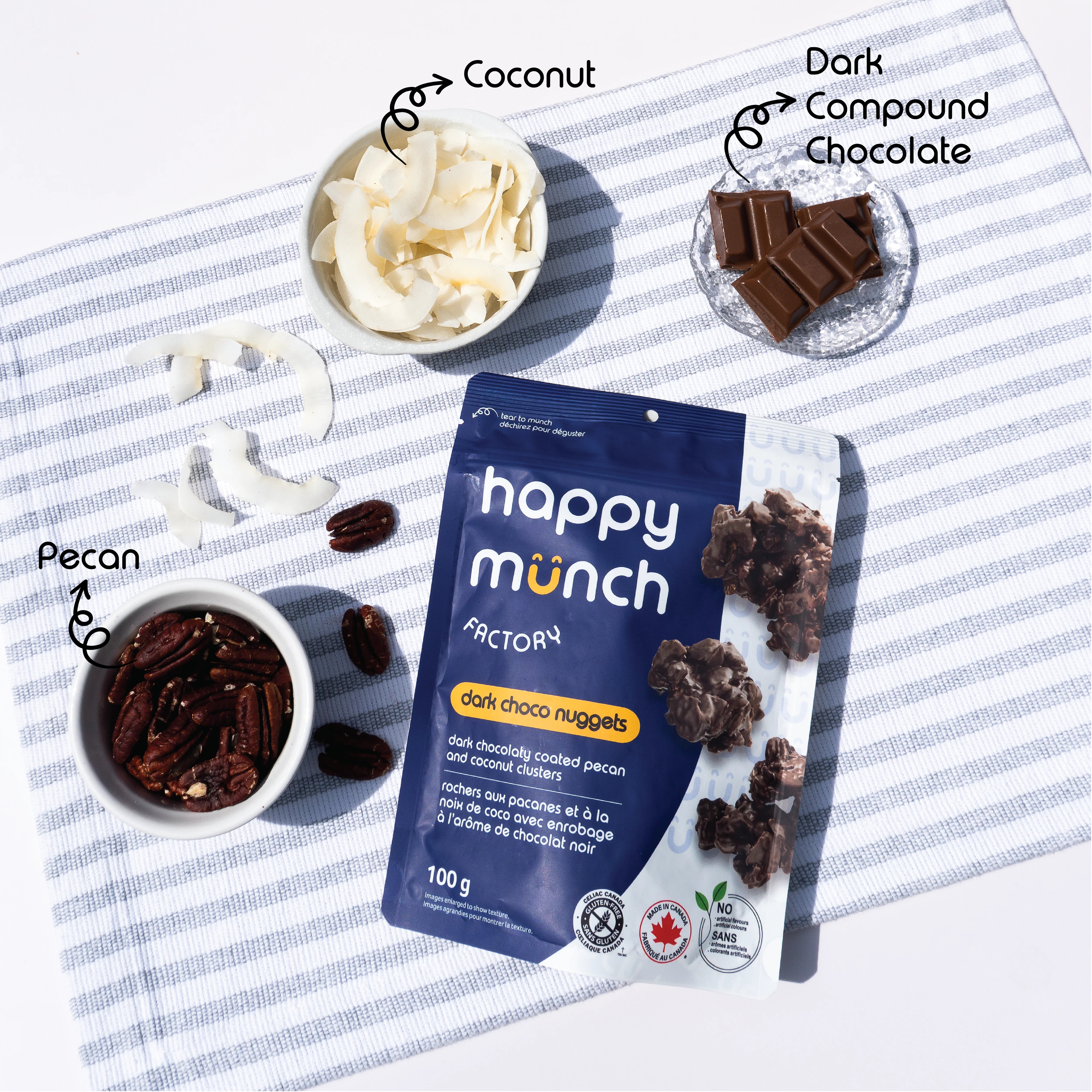 Happy Munch Factory dark choco nuggets packaging with ingredients on a striped fabric background