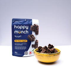 Happy Munch Factory dark choco nuggets packaging with a bowl of nuggets on a white background